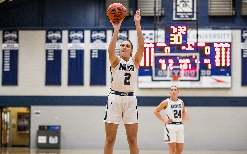 Graduate student forward Kayla Yoegel shoots a free throw during the first half of a game versus The Catholic University of America in Johnston Hall earlier this season. Photo by Cosmic Fox Media / Matthew Levine '11