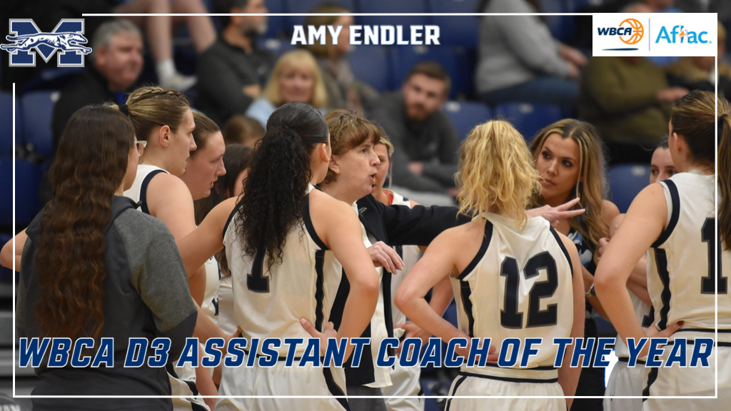 Amy Endler coaching in the huddle versus Elizabethtown College during the 2022-23 season.