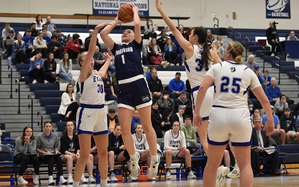 Senior forward Sam Osorio goes up for a lay-up late in the second quarter at Elizabetthown College in the 2024 Landmark Conference Semifinals. Photo by Christine Fox