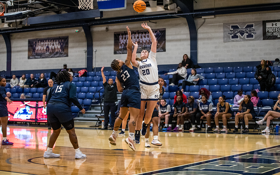 Sophomore forward Lanie Herbert goes up for a lay-up in the first half versus Saint Elizabeth University in the Steel Club Classic in Johnston Hall. Photo by Cosmic Fox Media / Matthew Levine '11