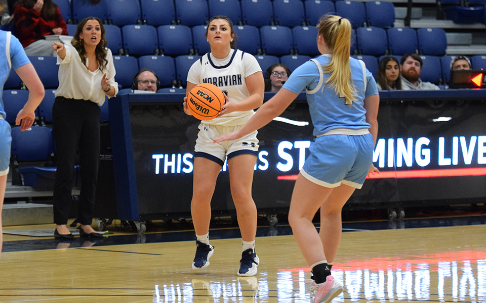 Sophomore guard Emma Altmire pulls up to shoot a three-pointer in the second half versus Immaculata University in Johnston Hall. Photo by Grace Nelson '26