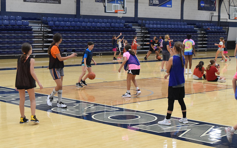 Action at the 2021 Moravian Girls Basketball Camp in Johnston Hall.