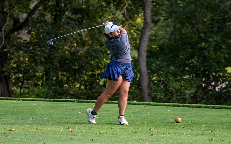 Junior Izzy Szmodis tees off during the Moravian Weyhill Classic at the Saucon Valley Country Club this fall. Photo by Cosmic Fox Media / Matthew Levine '11