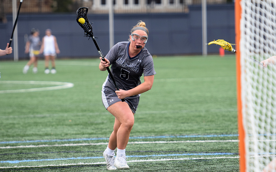 Megan Donnelly makes a move towards the net in a match versus College of Wooster on John Makuvek Field in March 2020. Photo by Nicole Palmasano