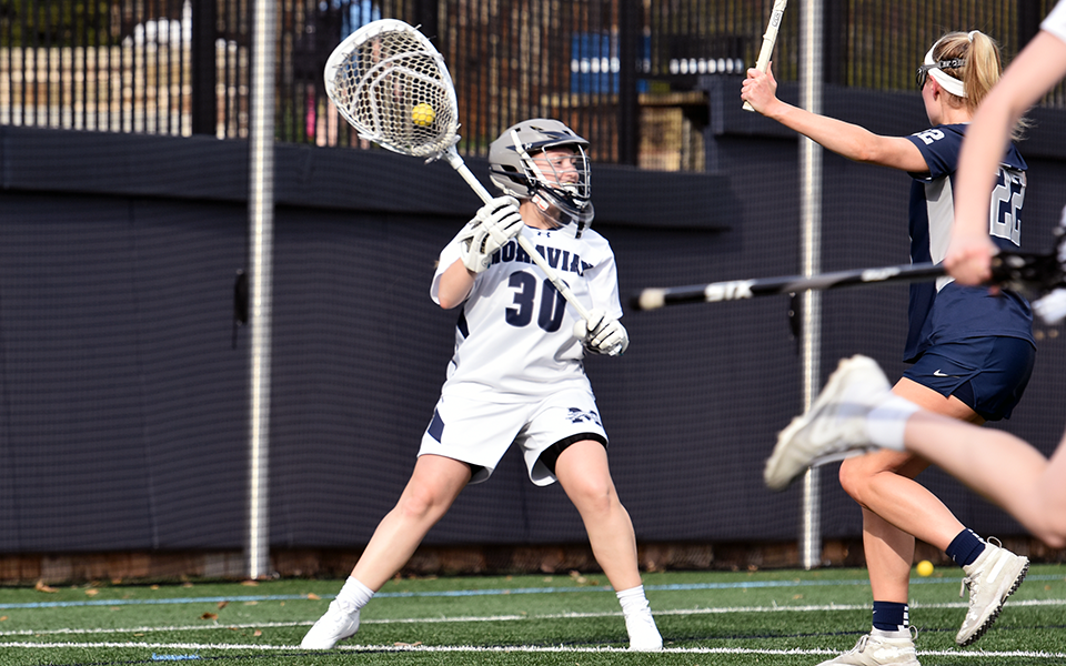 Junior goalie Brelyn Friedman starts a clearing attempt in a match versus The University of Mary Washington on John Makuvek Field. Photo by Ava Edwards '22