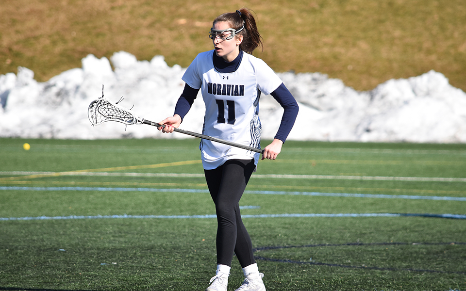 Junior midfielder Madi Dippel gets set for play to resume versus No. 10 The College of New Jersey on John Makuvek Field. Photo by Christine Fox