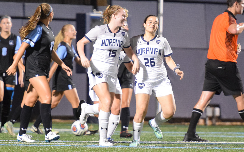 The Greyhounds celebrate senior Paige Weiss' goal in the victory over Stockton University on John Makuvek Field.