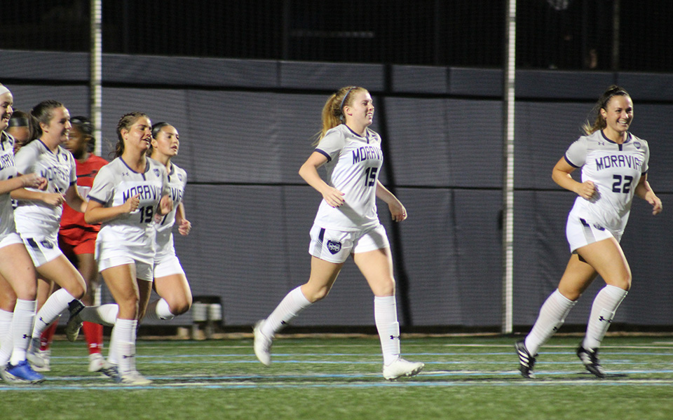 Senior Paige Weiss leads the Greyhounds back towards midfield after heading in the game-winning goal on a corner kick versus Albright College on John Makuvek Field.