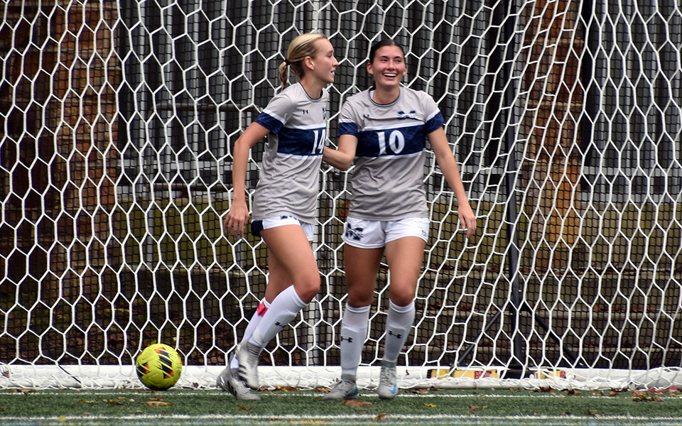 Seniors Kylie Hughes and Carly Pyatt after Pyatt headed in a goal from Hughes in the first half versus Eastern University on John Makuvek Field. Photo by Grace Nelson '26