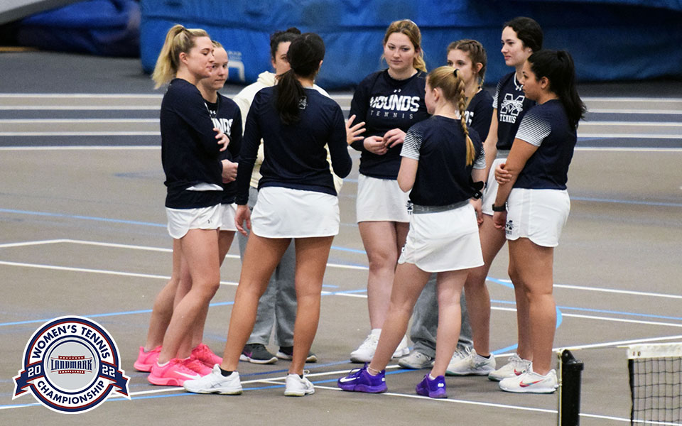 The Greyhounds talk before a match versus Bryn Mawr College in Timothy Breidegam Fieldhouse back in March 2022.