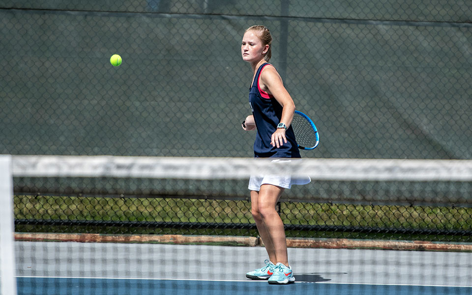 Julianne Cassady returns a shot on Hoffman Courts during the fall 2019 season. Photo from Image by Hugo.