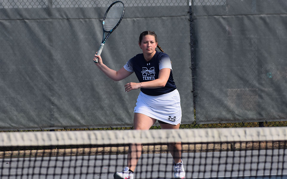 Sophomore Emily Masters returns a shot and was one of four Greyhounds to earn their first career singles win as Moravian swept Cedar Crest College at Hoffman Courts.