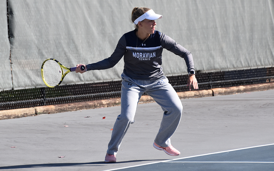 Senior Maddie Figiel returns a shot in doubles action versus Rutgers-Camden at Hoffman Courts to complete the 2022 fall season.