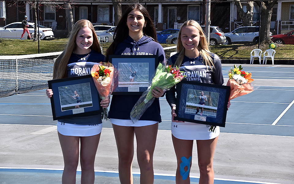 Seniors Julianne Cassady, Cristine Merone and Maddie Figiel were honored on Hoffman Courts before playing Goucher College on Senior Day.