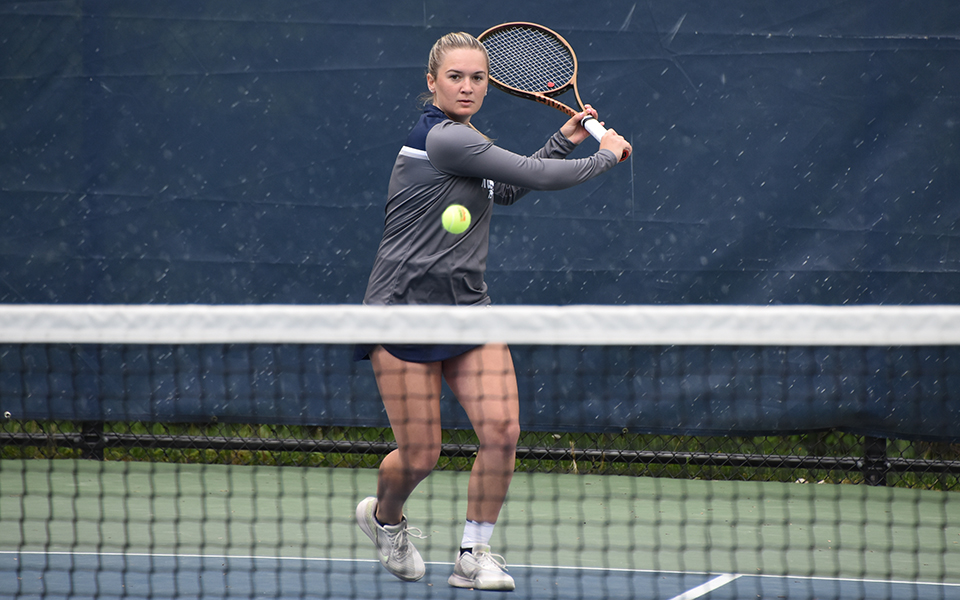 Freshman Lead Zolotareva returns a shot in doubles action at Drew University in the 2024 Landmark Conference Championship match.