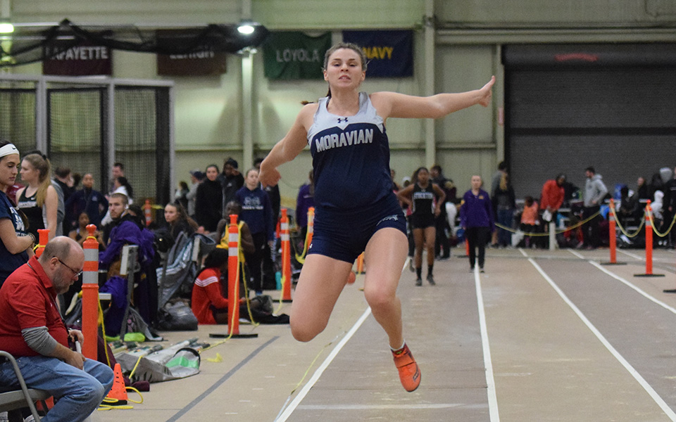 Sophomore Jenevieve Eberly competes in the long jump at the Moravian Indoor Invitational at Lehigh University.