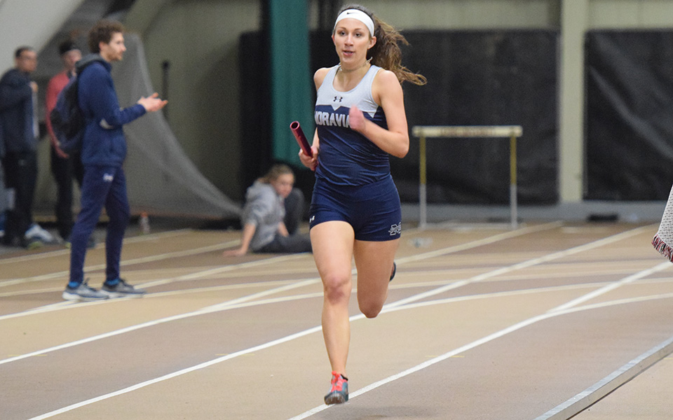 Sophomore Morgan Weaver runs in a relay race during the Moravian Indoor Invitational at Lehigh University in January 2019.