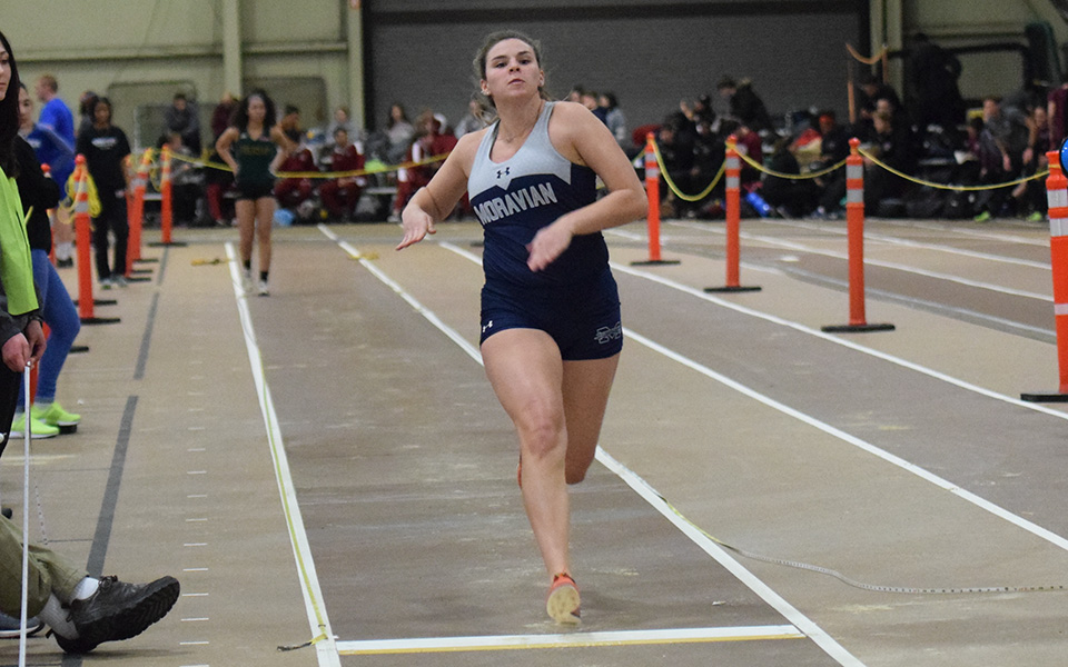 Junior Jenevieve Eberly takes off in the long jump at the Moravian Indoor Meet in Lehigh University's Rauch Fieldhouse.