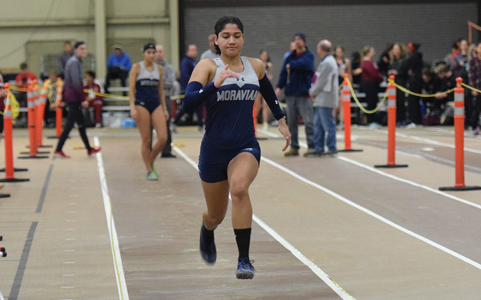 Freshman Helen Davis competes in the long jump during the Moravian Indoor Meet at Lehigh University's Rauch Field House.