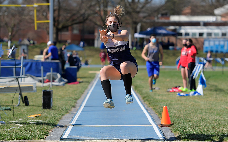 Haylee Saylor '23 competes in the long jump at the Elizabethtown Early Bird Opener. Photo courtesy of Patrick Blain