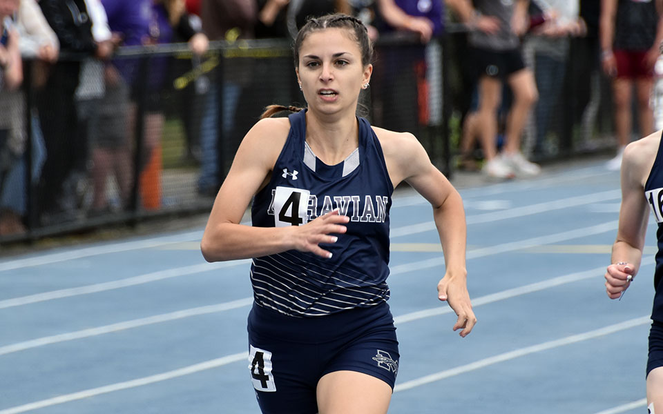 Senior Natalie Stabilito finishes the 1,500-meter run at the 2022 All-Atlantic Region Championships at Timothy Breidegam Track as she went from last place to fifth on the final lap. Photo by Christian Jancsarics '23