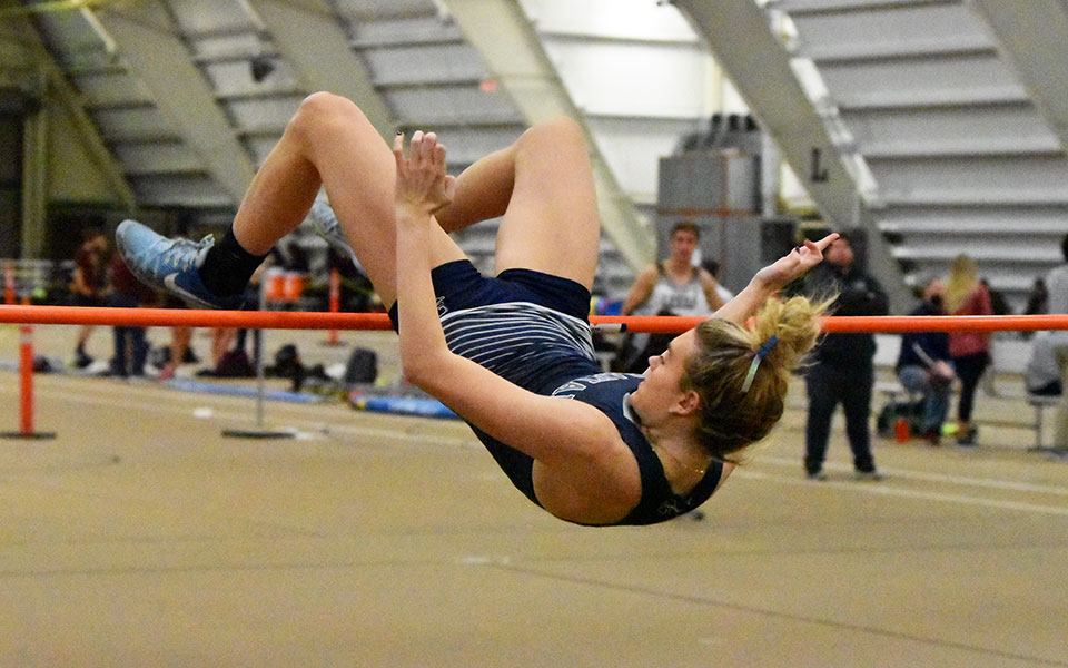 Sophomore Alexis Groff clears the bar in the high jump at the Lehigh University Fast Times Before Finals at Rauch Fieldhouse.