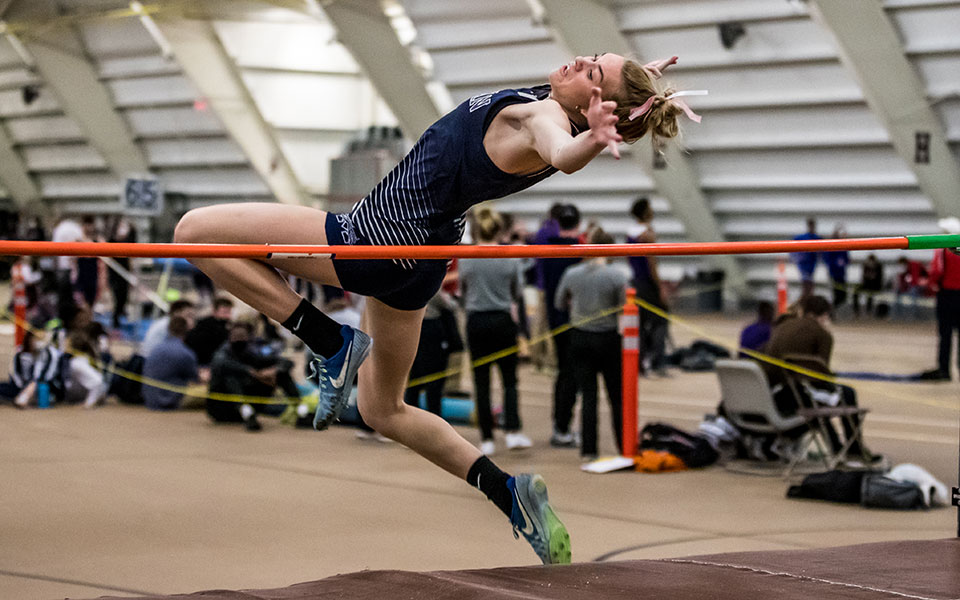 Sophomore Lexi Groff clears the bar in the high jump during the Moravian Indoor Meet at Lehigh University's Rauch Fieldhouse. Photo by Cosmic Fox Media / Matthew Levine '11