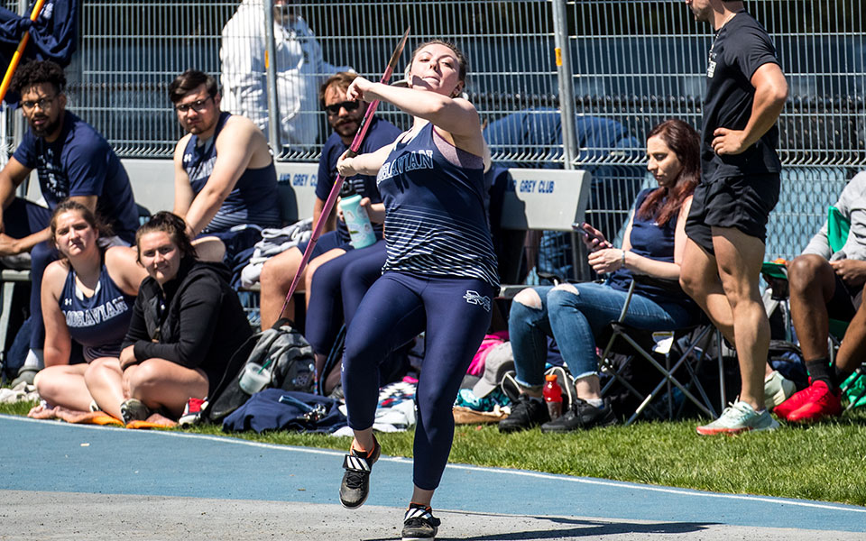 Junior Delaney Wiseman competes in the javelin at the Greyhound Invitational at Timothy Breidegam Track in April 2022. Photo by Cosmic Fox Media / Matthew Levine '11