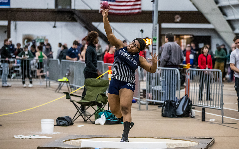 Freshman Margie Rayne competes in the shot put during the Moravian Indoor Meet at Lehigh University's Rauch Fieldhouse. Photo by Cosmic Fox Media / Matthew Levine '11