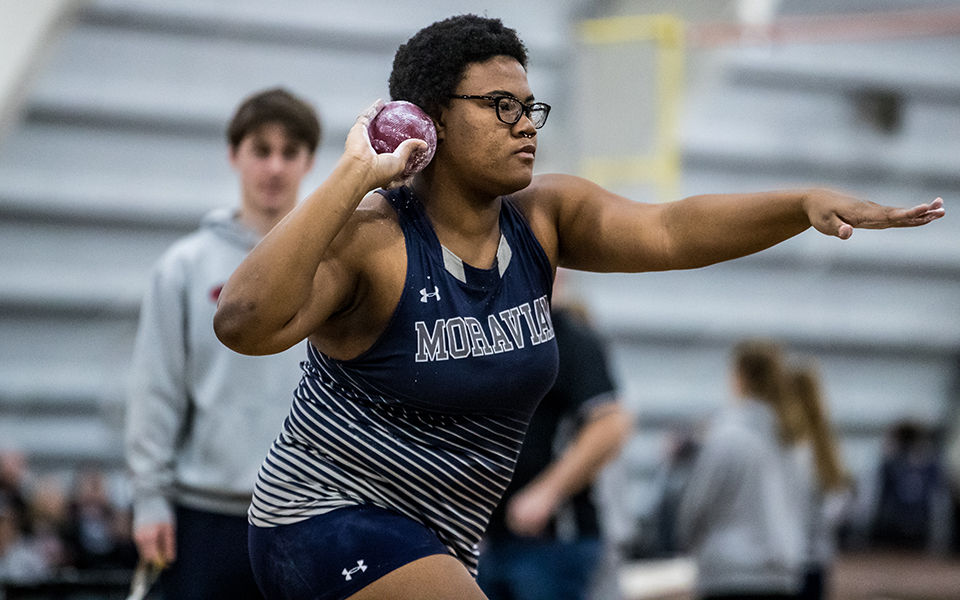 Sophomore Margie Rayne competes in the shot put during the Moravian Indoor Meet at Lehigh University's Rauch Field House. Photo by Cosmic Fox Media / Matthew Levine '11