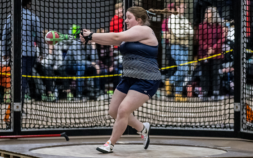 Junior Caillie Fish competes in the 20-pound weight throw during the Moravian Indoor Meet at Lehigh University's Rauch Field House. Photo by Cosmic Fox Media / Matthew Levine '11