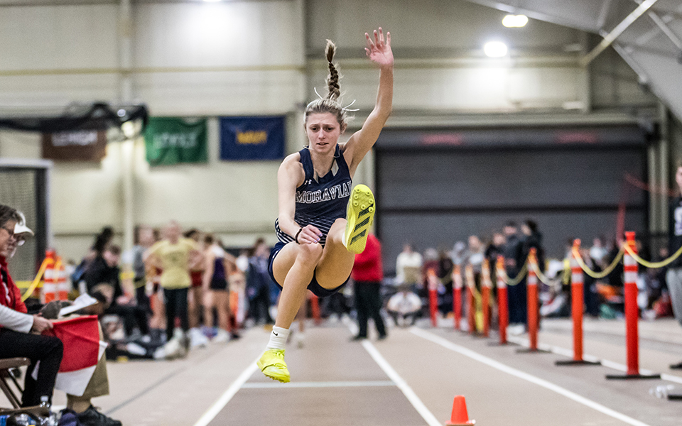 Sophomore Ali Haefele competes in the long jump at the Moravian Indoor Meet in Lehigh University's Rauch Field House. Photo by Cosmic Fox Media / Matthew Levine '11