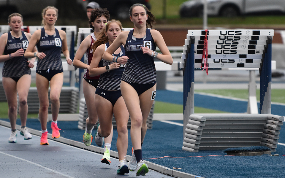 Sophomore Tara Smurla leads the 10,000-meter run at the 2024 Coach Pollard Invitational at Timothy Breidegam Track.