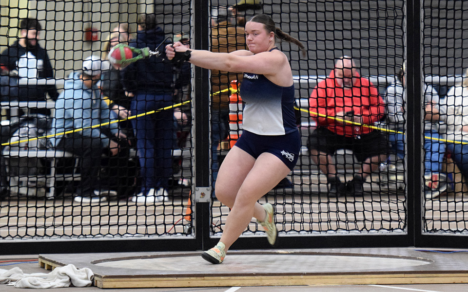 Junior Kara Vashey competes in the 20-pound weight throw at the Lehigh University Fast Times Before Finals at Rauch Fieldhouse.