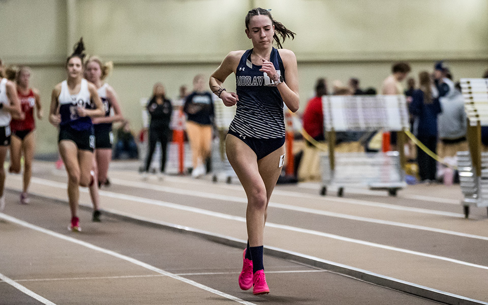 Junior Tara Smurla runs during the 2024 Moravian Indoor Meet at Lehigh University's Rauch Fieldhouse. Photo by Cosmic Fox Media / Matthew Levine '11