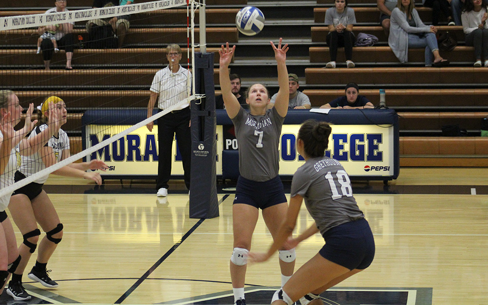 Senior Victoria Kauffman sets up an attack attempt for sophomore Renee Mapa in a match versus Cedar Crest College in Johnston Hall.