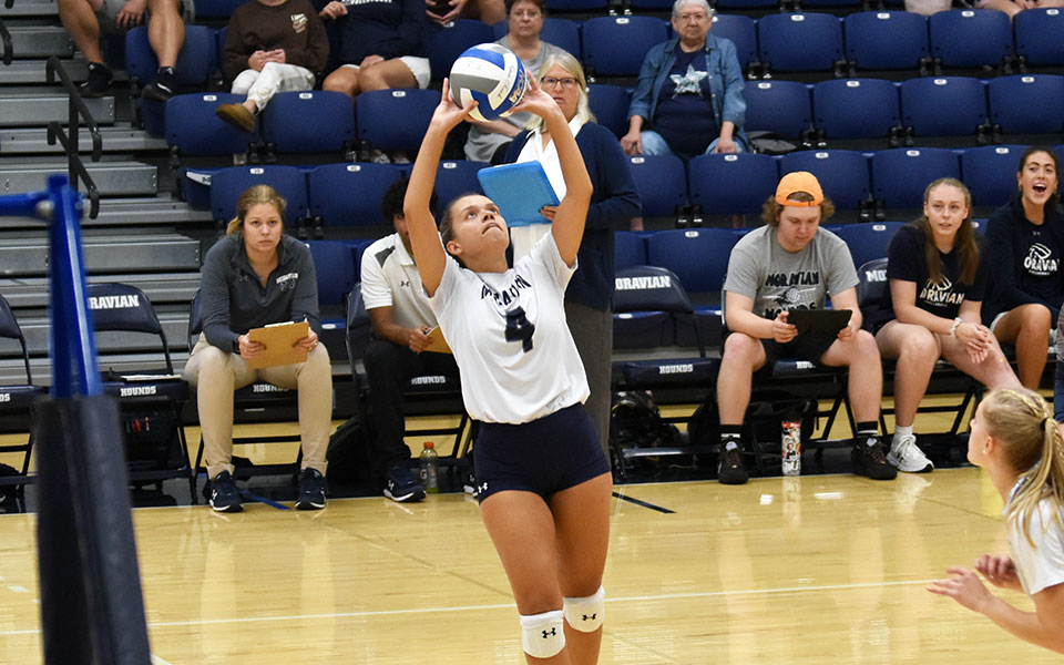 Senior Natalia Matos sets a ball versus Lancaster Bible College in Johnston Hall. Matos became the ninth Greyhound to reach 1,000 career assists during the match. Photo by Alex Dillon '26