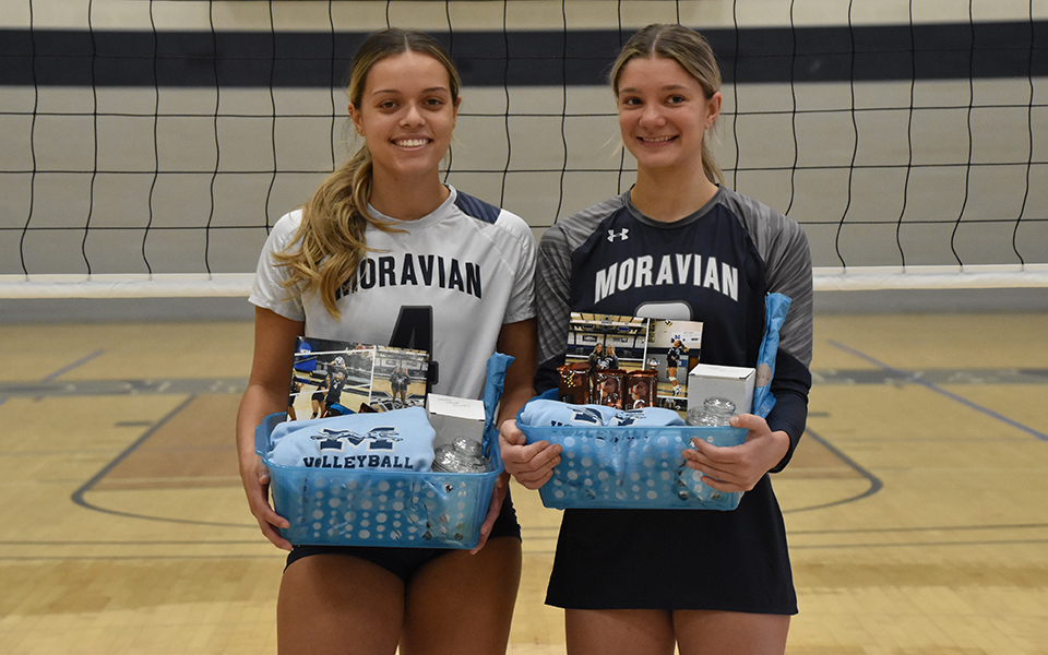 Seniors Natalia Matos and Gabby Mancini were honored prior to the Greyhounds' match with Pratt Institute in Johnston Hall. Photo by Mairi West '23