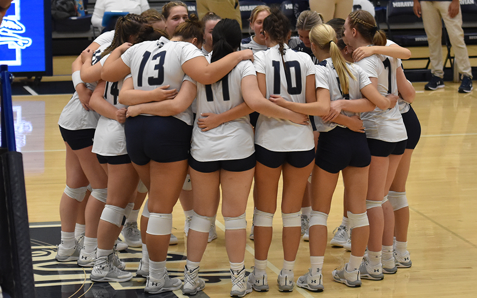 The Greyhounds huddle before a match versus DeSales University in Johnston Hall earlier this season. Photo by Mairi West '23
