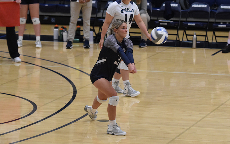 Senior libero Gabby Mancini digs an attack attempt versus DeSales University in Johnston Hall in a match from earlier in the 2022 season. Photo by Mairi West '23