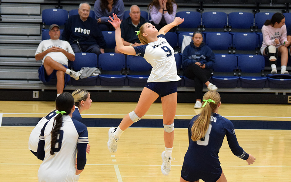 Junior outside hitter Caroline Melillo attacks a ball in the third set versus Bryn Mawr College in Johnston Hall. Photo by Grace Nelson '26