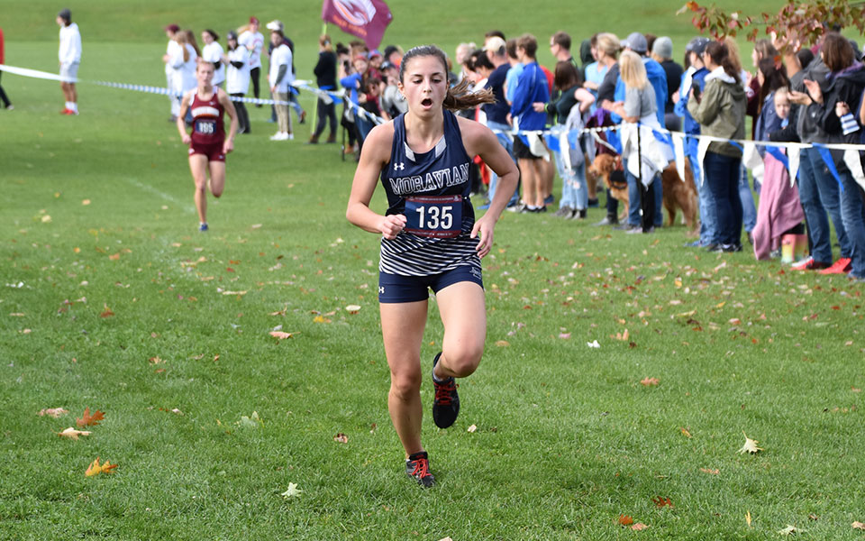 Senior Natalie Stabilito comes into the finish line at the 2021 Landmark Conference Championships at Bicentennial Park.