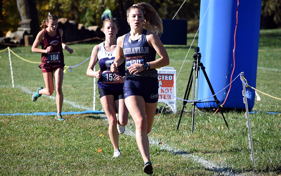 Sophomore Amber Poniktera runs in the 2022 Landmark Conference Championships at Goucher College. Photo courtesy of Goucher College Athletic Communications