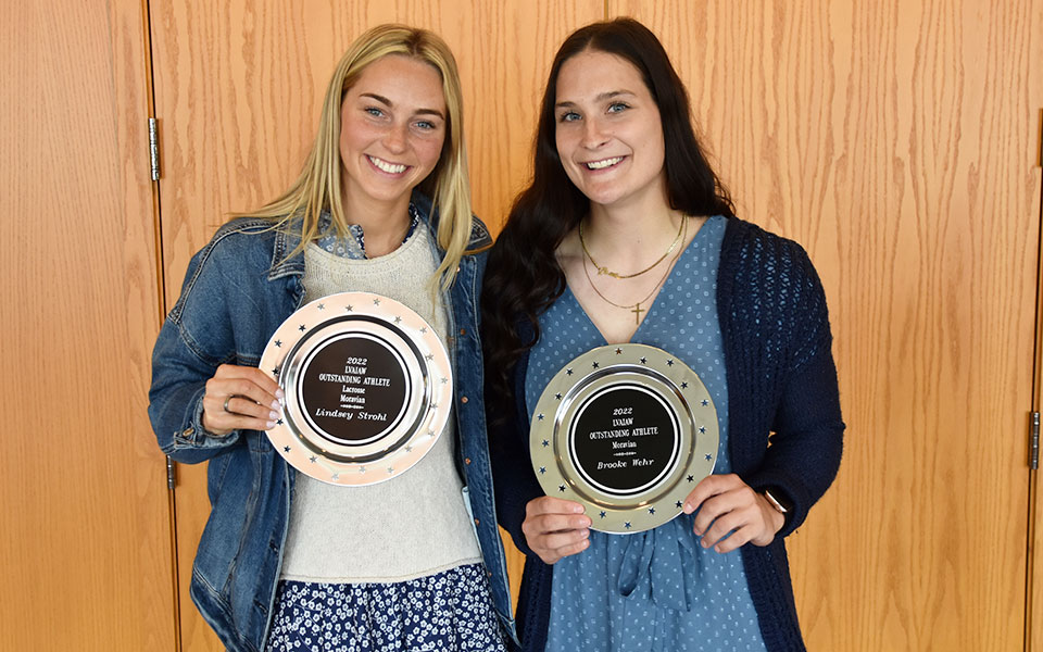 Seniors Lindsey Strohl and Brooke Wehr with their Lehigh Valley Association of Intercollegiate Athletics for Women awards at DeSales University.