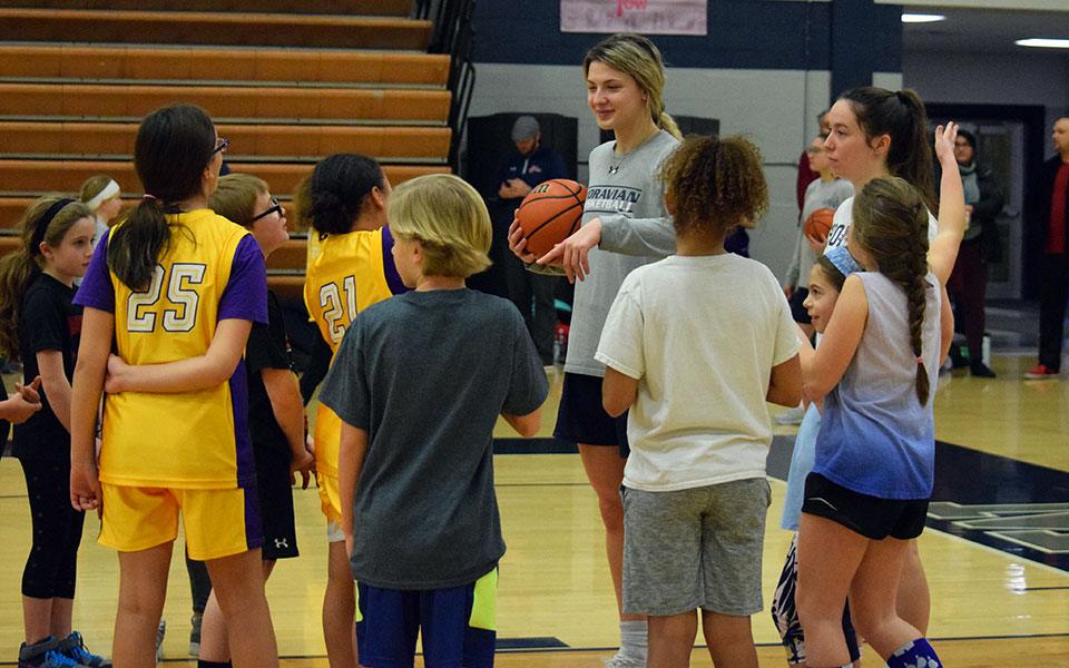 Junior Emily Markowski gives instructions during the 2020 Play4Kay Clinic in Johnston Hall.