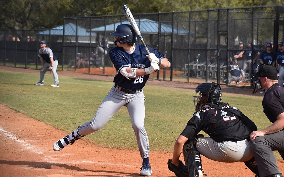 Freshman outfielder Jared Ferguson gets set to swing during an at-bat versus Rose-Hulman Institute of Technology in Auburndale, Florida earlier this season. Photo by Christine Fox