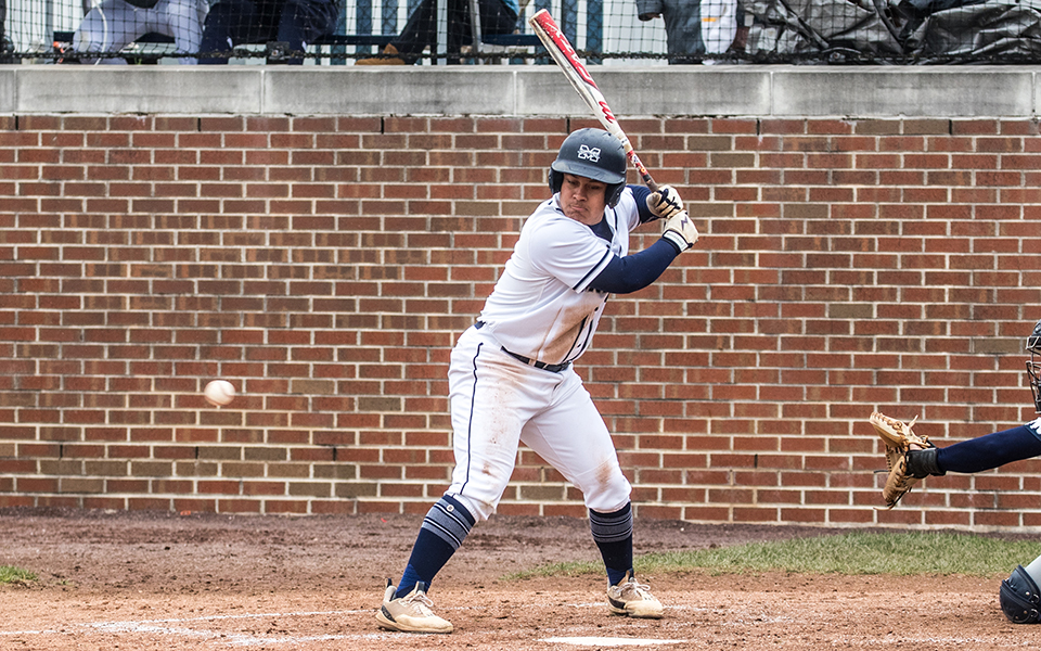 Graduate student Chris Pow gets set to swing at a pitch versus Juniata College at Blue & Grey Field this season. Photo by Cosmic Fox Media / Matthew Levine '11