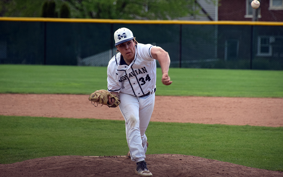 Freshman Nate McBride pitches versus The Catholic University of America at Gillespie Field. Photo by Marissa Williams '26