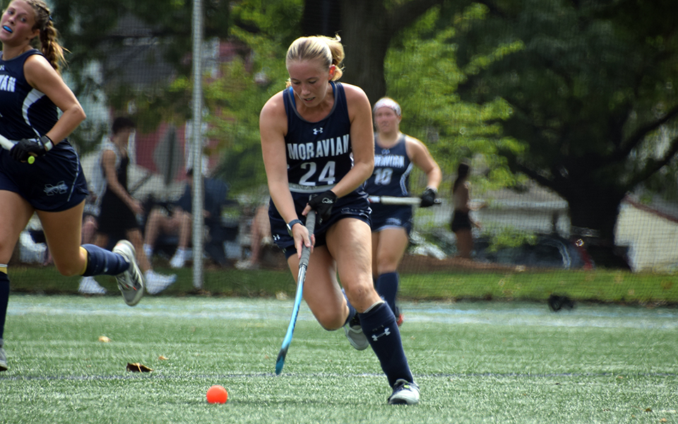 Senior forward Hanna Leto moves the ball up the field during the second half versus Muhlenberg College on John Makuvek Field. Photo by Avery Saladino '24