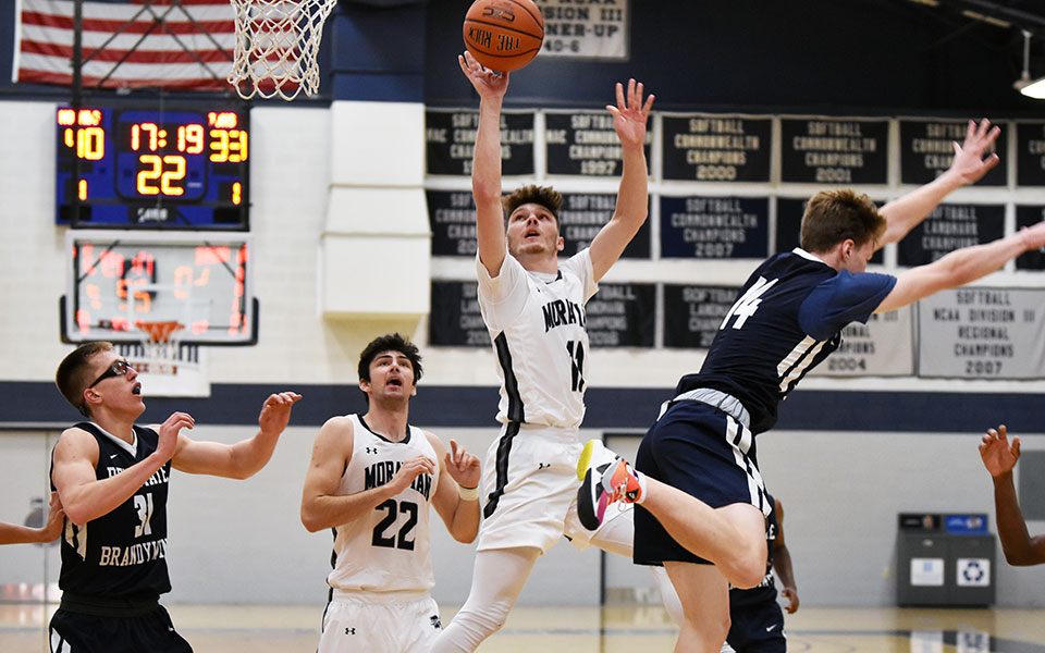 Junior Nate Dougherty drives to the basket for a lay-up in the second half versus Penn State Brandywine in Johnston Hall. Photo by Mairi West '23.